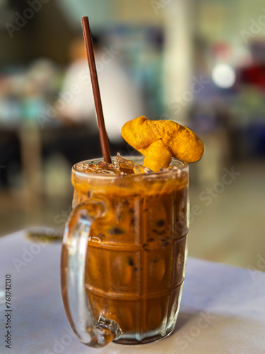 Espresso coffee, iced, decorated with Patongko