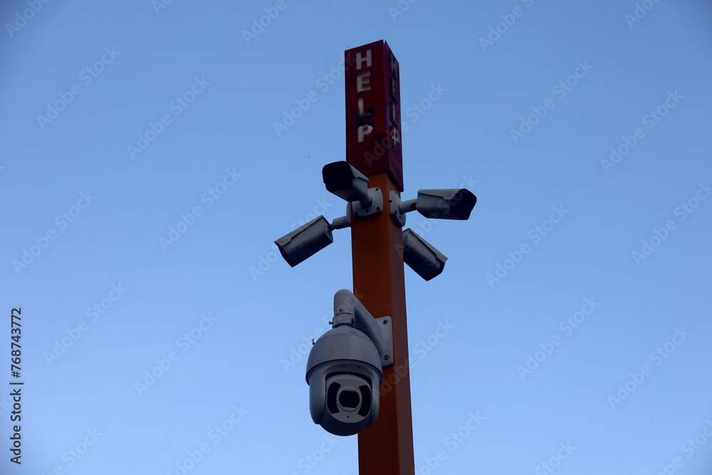multi-angle CCTV with a rotating camera on a CCTV pole in urban areas, digital surveillance of citizen activities in urban areas. multi-angle CCTV with a rotating camera on a CCTV pole in urban areas, digital surveillance of citizen activities in urban areas.