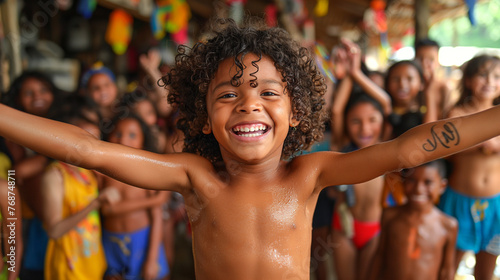 Inside a bustling community center in a Rio favela, young children eagerly participate in a capoeira workshop, their laughter and exuberance filling the air as they learn the intri
