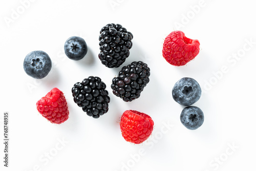 Mix of fresh berries  raspberry  blackberry  blueberry on a white background