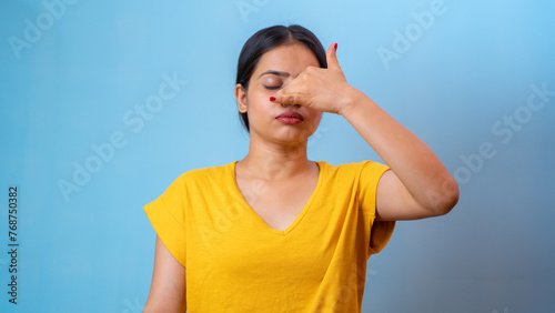 Fotografie Beautiful woman practicing Anulom Vilom Pranayama, also known as Alternate nostr