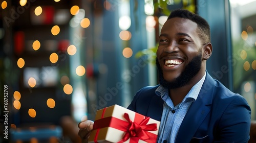 Successful Businessman Graciously Accepting Thoughtful Gift with Genuine Appreciation photo
