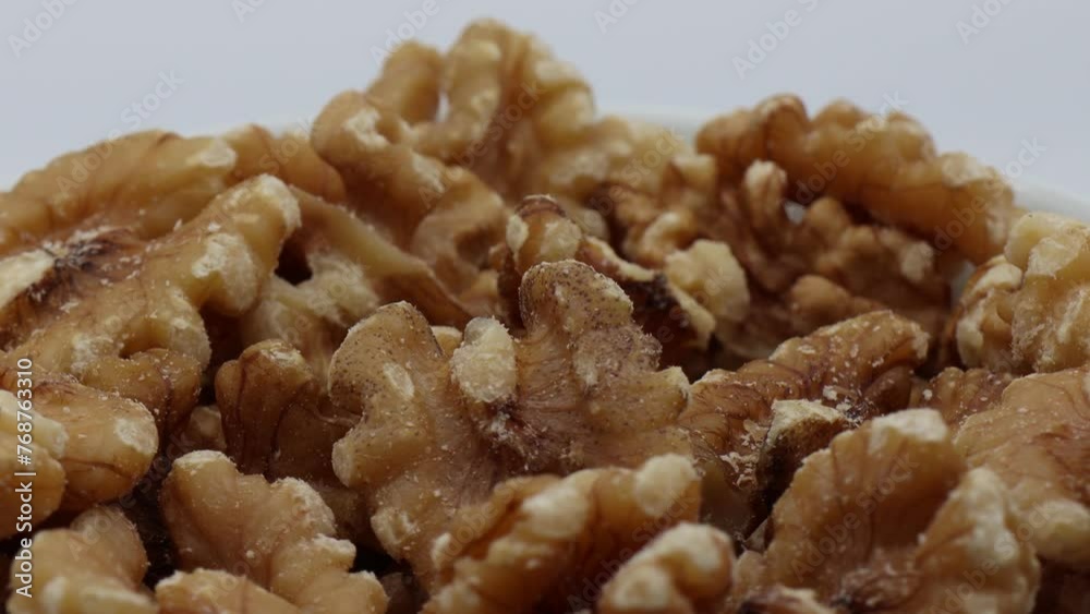 Fresh walnuts in a bowl. Close-up. Video 4k Fresh walnuts in a bowl. Close-up. Video 4k