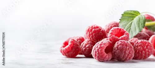 Juicy ripe raspberries arra...
