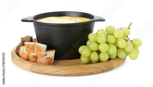 Fondue with tasty melted cheese and grapes isolated on white