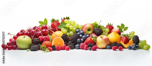 An assortment of various fresh fruits including apples, oranges, and bananas, stacked together on a plain white background