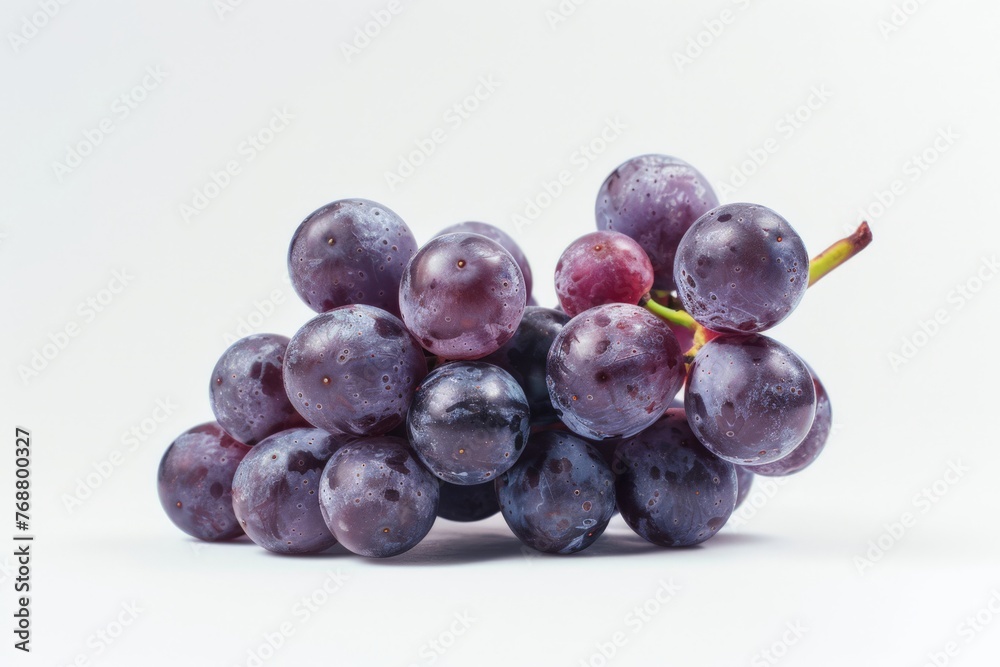 Purple grapes, a staple food, are a beautiful fruit from the grapevine family Purple grapes, a staple food, are a beautiful fruit from the grapevine family