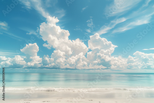 Beautiful seascape background with blue sky and white clouds on the horizon