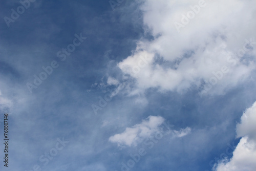 Clouds in the blue sky background, cloudscape sky, soft color © Eriko Ochiai