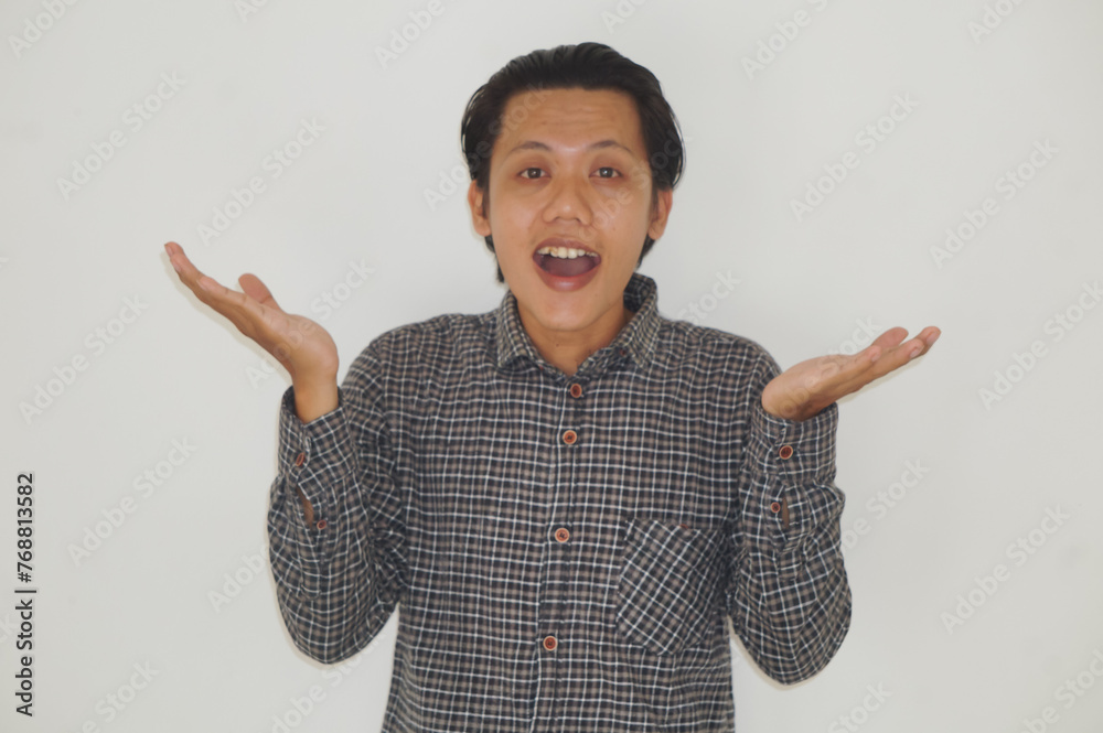 Happy expression of young Asian man in black shirt isolated on white background. Happy expression of young Asian man in black shirt isolated on white background.