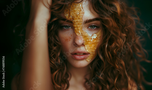Fashion commercial Concept. Portrait of pretty woman with tousled hair, dewy skin fresh freckle radiant shiny face with honey liquid dripping, for beauty makeup skincare ad. copy text space