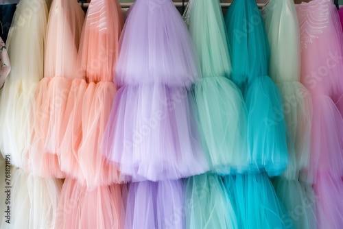 dreamy tulle skirts of dresses filling a shops rack