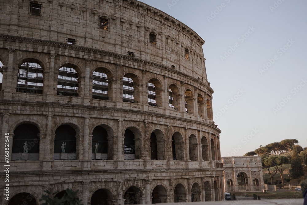 Mesmerizing view of the huge and mythical Colosseum in Rome