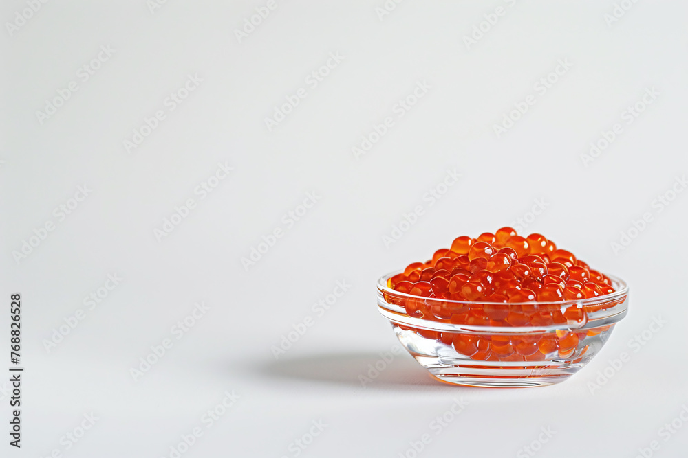 bowl of red caviar isolated on white backgrond, close up bowl of red caviar isolated on white backgrond, close up