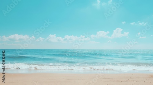 Sun-kissed beach with clear blue skies, gentle waves, and soft sand, space for vibrant text - summer vibes