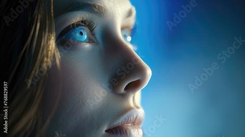 Close-up of a woman's eye reflecting light