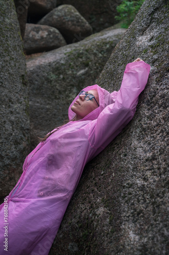 Woman in the taiga forest a...