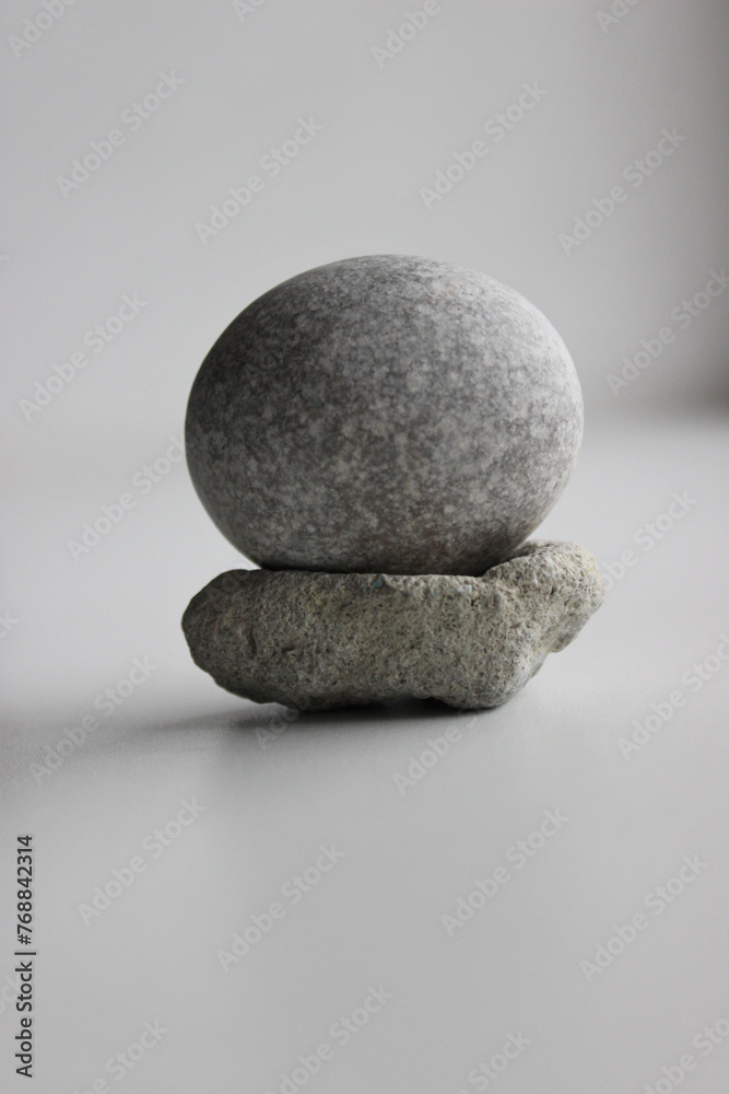 Equilibrium Concept Image. Smooth Round Stone On Another Porous Stone Equilibrium Concept Image. Smooth Round Stone On Another Porous Stone