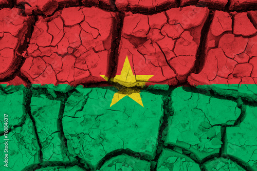Dry soil pattern on the flag of Burkina Faso. Country with drought concept due to climate change. Water problem. Dry cracked earth country.