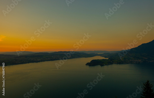 Aerial View over Lake Lucerne and Mountain in Sunset in Lucerne, Switzerland. © Mats Silvan