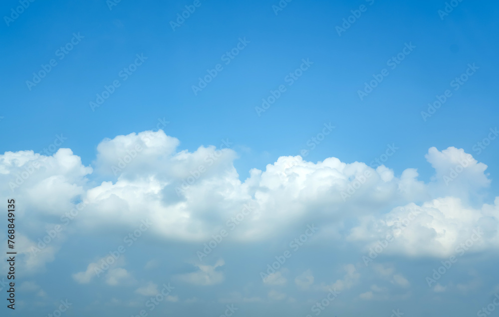 cumulus clouds and blue sky