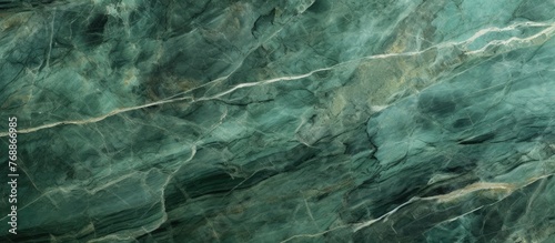 This detailed close-up showcases the intricate veining and unique texture of a matt green marble surface, suitable for use in ceramic tiles, Terrazzo flooring, and wall installations. The vibrant