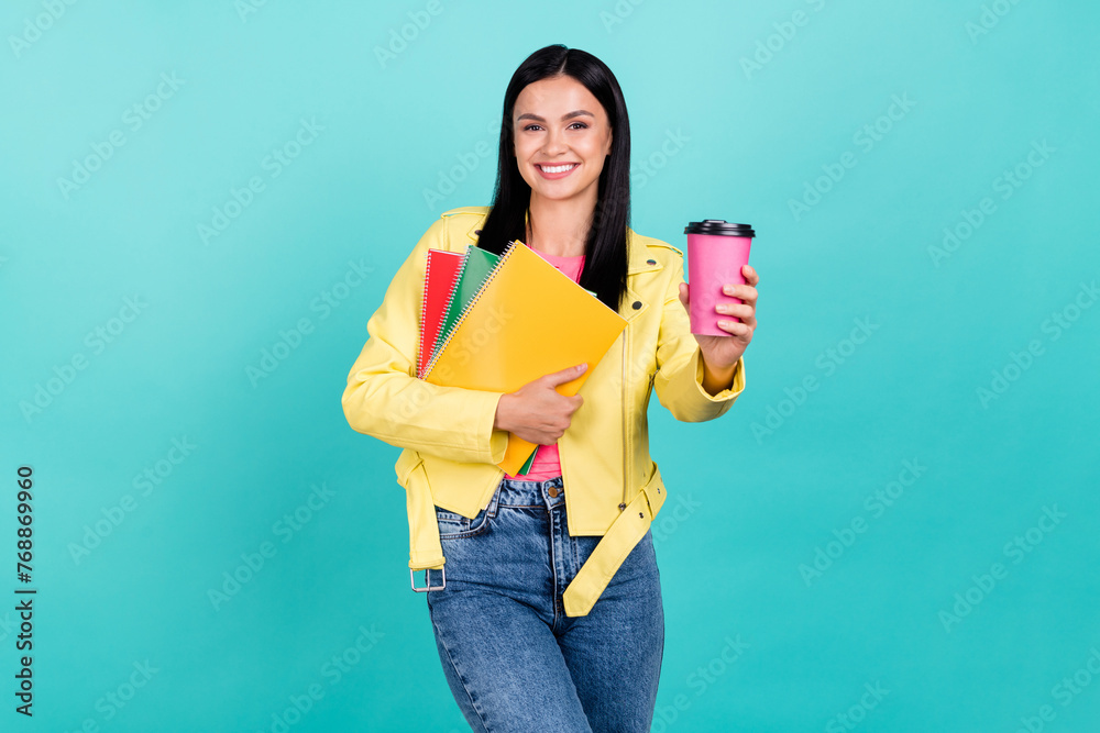 Photo of young lady enjoy break after class drink latte learn college notebook isolated over turquoise color background Photo of young lady enjoy break after class drink latte learn college notebook isolated over turquoise color background