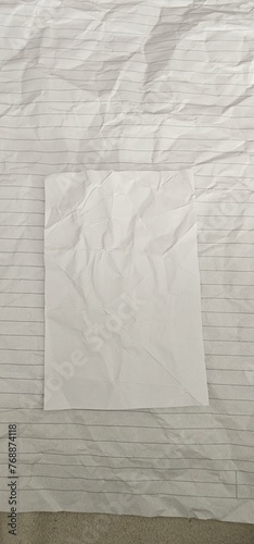 crumpled sheet of paper