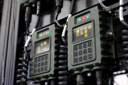 Close up of military radio station installed on an armored vehicle.
