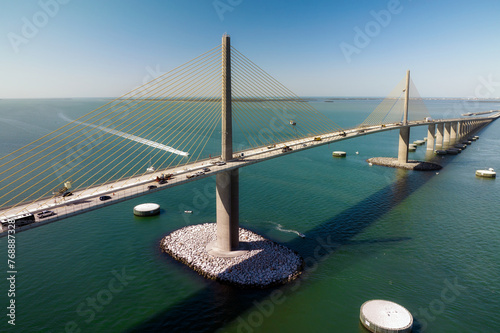 Aerial view of Sunshine Skyway Bridge over Tampa Bay in Florida with moving traffic. Concept of transportation infrastructure