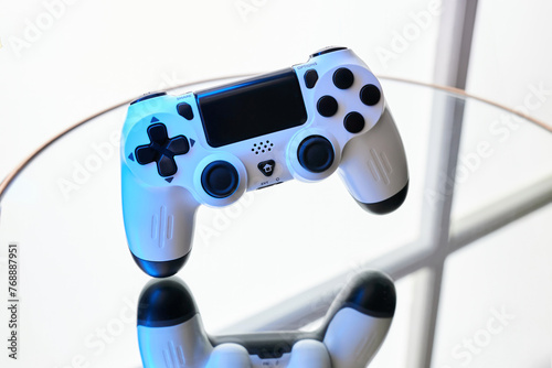 Gamepad on abstract background with light effects