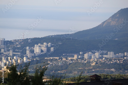 view of the city of Alushta and Mount Kostel from Mount Demerdzhi on a sunny summer day in Crimea photo