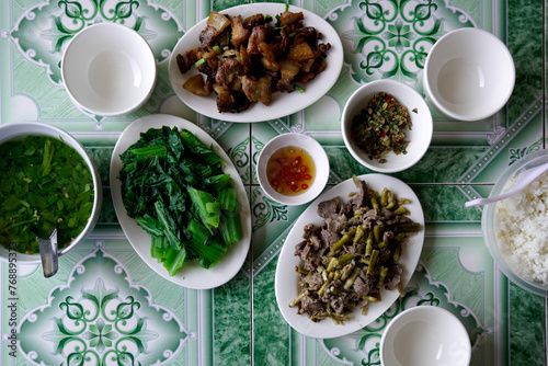 Delicious and simple family meal served at a homestay in Ha Giang, Vietnam photo