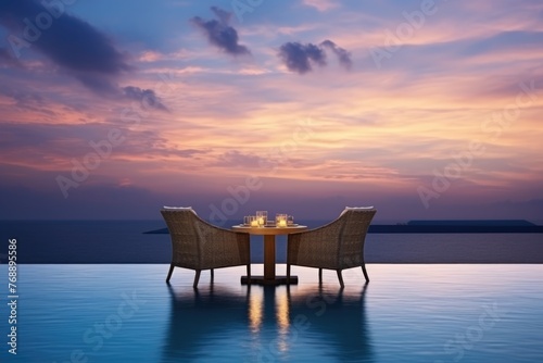 Elegant dining setup for two with candles on a table overlooking the sea during twilight. Twilight Ambiance  Oceanfront Dining