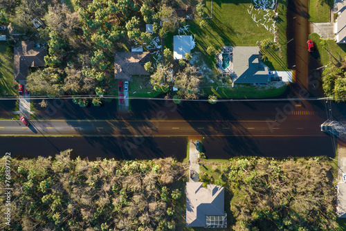Hurricane flooded street in Florida residential area. Consequences of natural disaster