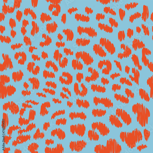 Seamless ikat leopard pattern on blue background.