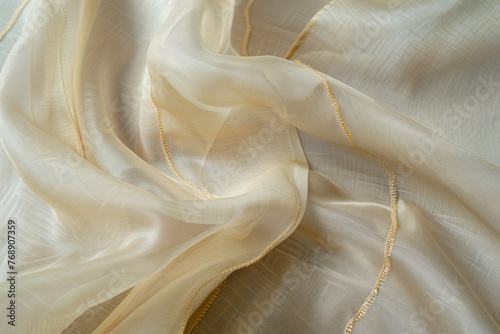 closeup of a french seam on a sheer curtain fabric