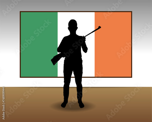 Man holding a gun in front of Ireland flag, fight or war idea