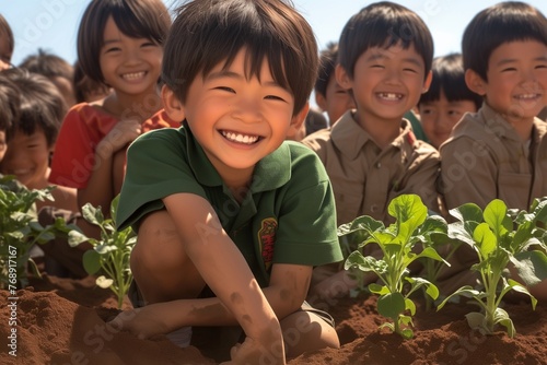 Children are helping to plant vegetables in the school garden during agriculture class