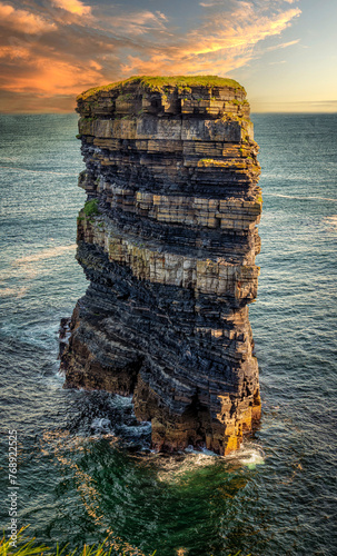 Dun Briste Sea Stack - Giant Rock Protruding From Ocean photo