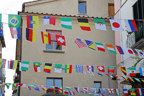 Fototapeta Naklejka Na Ścianę i Meble -  World Flags International Festival Decoration Over Streets in Town