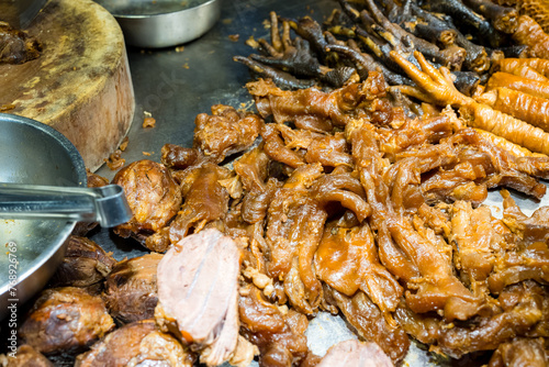 Braised pork and chicken legs in soy sauce sell in street market