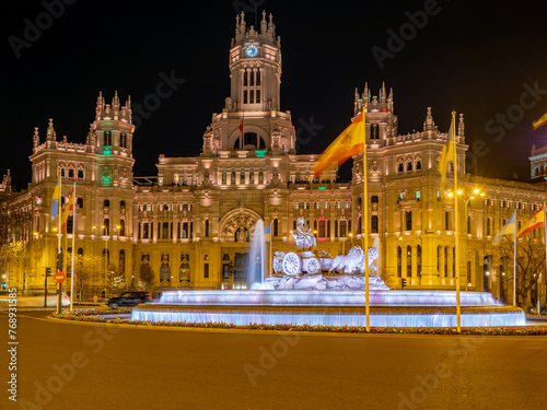 Madrid City Hall at night with the Cibeles fountain.