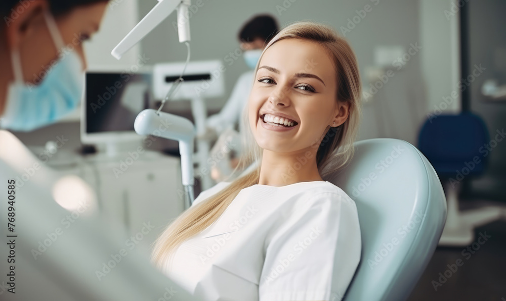 Beautiful woman sitting in dental chair while professional doctor fixing her teeth. Dental care concept Beautiful woman sitting in dental chair while professional doctor fixing her teeth. Dental care concept