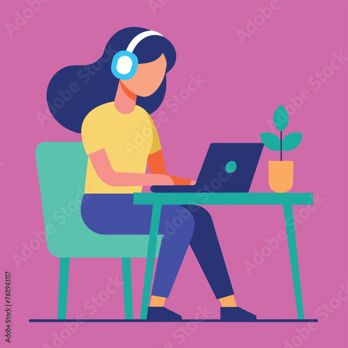 Woman sitting at the desk works in the office