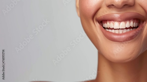 Happy smiling young woman, close-up portrait, perfect teeth, oral dental care, positive emotions.