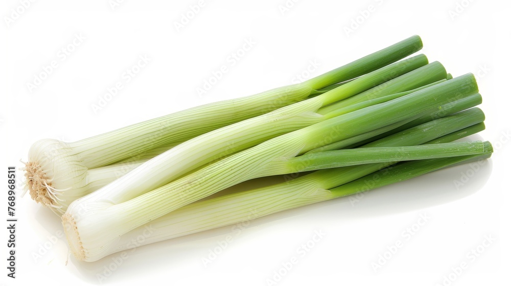 Fresh leek vegetable isolated on white background, organic ingredient for healthy cooking Fresh leek vegetable isolated on white background, organic ingredient for healthy cooking