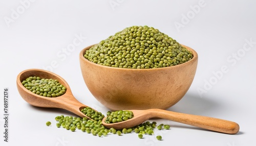 green mung beans with bowl and wooden spoon isolated on white background
