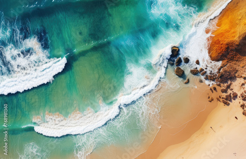 Beach and waves from top aerial view. Turquoise water background from top view. Summer seascape from air. Top view from drone. Travel concept and idea © ribelco