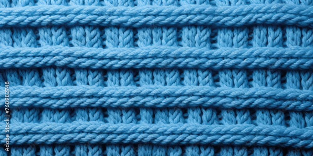 Texture of knitted fabric. Classic blue color. Theme of hobby and creativity